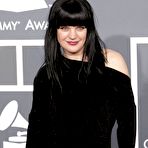 Second pic of Pauley Perrette posing in black dress at Grammy Awards