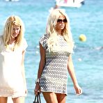 First pic of Victoria Silvstedt in yellow bikini on a yacht