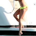 Third pic of Victoria Silvstedt in yellow bikini on a yacht