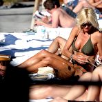 Second pic of Victoria Silvstedt in green bikini on the beach in Caribbean