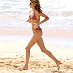 Third pic of Gisele Bundchen wearing a bikini on the beach