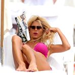 First pic of Victoria Silvstedt in pink bikini on a beach