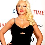 Third pic of Christina Aguilera slight cleavy in tight black dress