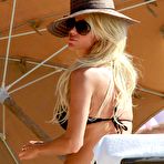 Fourth pic of Victoria Silvstedt in black bikinies candids in Miami