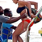 First pic of Rosario Dawson caught on the beach in Barbados