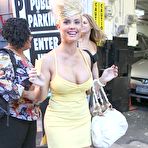 First pic of Busty Nicole Austin shows deep cleavage in short yellow dress