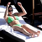 First pic of Kelly Brook deep cleavage in green bikini