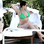 Fourth pic of Kelly Brook deep cleavage in green bikini