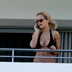 First pic of Rita Ora caught in bikini paparazzi shots