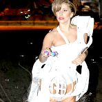 First pic of Lady Gaga posing in see through white dress