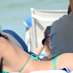 Fourth pic of Adriana Lima in green bikini on a beach