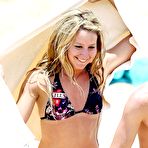 First pic of Ashley Tisdale surfing in Hawaii paparazzi shots