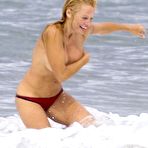 First pic of Pamela Anderson goes topless on a beach in France