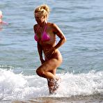 Fourth pic of Pamela Anderson hard nipples under pink bikini