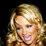 Third pic of Pamela Anderson shows deep cleavage at Chinese New Year Party