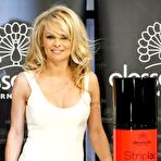 Second pic of Pamela Anderson in tight white dress