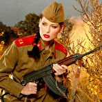 First pic of Evelyn Lory stripping out of her Soviet army uniform