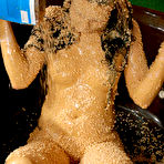 Third pic of Girl coated in peanutbutter and rice krispies
