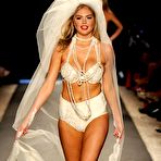 Third pic of Kate Upton legs and cleavage at Beach Bunny show