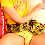 Second pic of Pigtails Redhead In Yellow Plaid Skirt