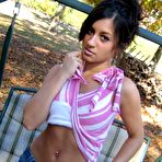 Second pic of Raven Riley in a swing outdoors