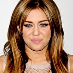 Second pic of Miley Cyrus shows deep cleavage at Pre GRAMMY 2011 Gala