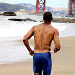 Second pic of Black Muscle Man Working Out on The Beach
