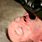 Fourth pic of OWK - Mistress in black latex catsuit humiliates her slave