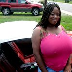 First pic of Nature Breasts - Huge Boobs Ebony Posing Near Cabriolet