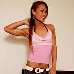 Second pic of Long haired ladyboy in pink top stripping