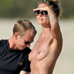 Second pic of Heidi Klum topless on the beach paparazzi shots