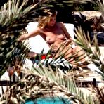 Third pic of Heidi Klum topless on the beach paparazzi shots