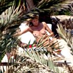 Fourth pic of Heidi Klum topless on the beach paparazzi shots