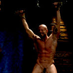 Second pic of Bound Gods - Strong gays showing muscles in underground rope bondage sex and body torturing