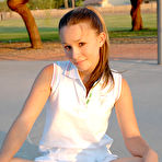 Fourth pic of Petite angel Josie graffitiing the basketball court without panties under tennis skirts