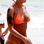 Fourth pic of Amber Rose topless on the beach paparazzi shots