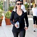 Third pic of Busty Kim Kardashian in tight black clothing