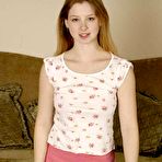 First pic of Petite coed redhead slips off her panties and flashes