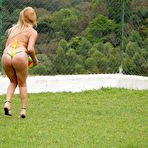 First pic of Tranny in string bikini playing volley ball