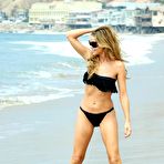 Third pic of Denise Richards looking sexy in black bikini at Malibu beach