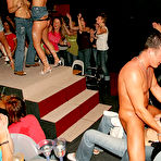 Fourth pic of :: PARTY HARDCORE :: Horny drunken women enjoy strippers dick in the club