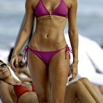 First pic of Stacy Keibler in blue and pink bikini on the beach paparazzi shots