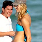 Third pic of Stacy Keibler in blue and pink bikini on the beach paparazzi shots