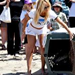 First pic of Pamela Anderson in shorts and tanktop supporting PETA at Malibu Beach