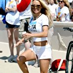 Third pic of Pamela Anderson in shorts and tanktop supporting PETA at Malibu Beach