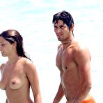 First pic of Belen Rodriguez caught topless on the beach