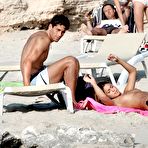 Second pic of Belen Rodriguez caught topless on the beach