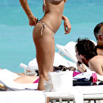 Fourth pic of Belen Rodriguez caught topless on the beach