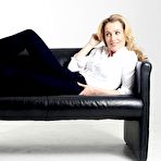 Fourth pic of Gillian Anderson in white blouse & black trousers