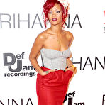 First pic of Rihanna sexy in short red skirt at Christmas lights in London